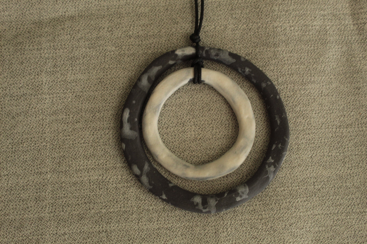 Black and white hoops porcelain necklace with white design