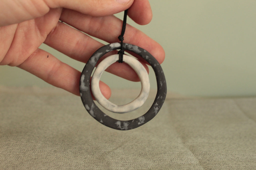 Black and white hoops porcelain necklace with white design
