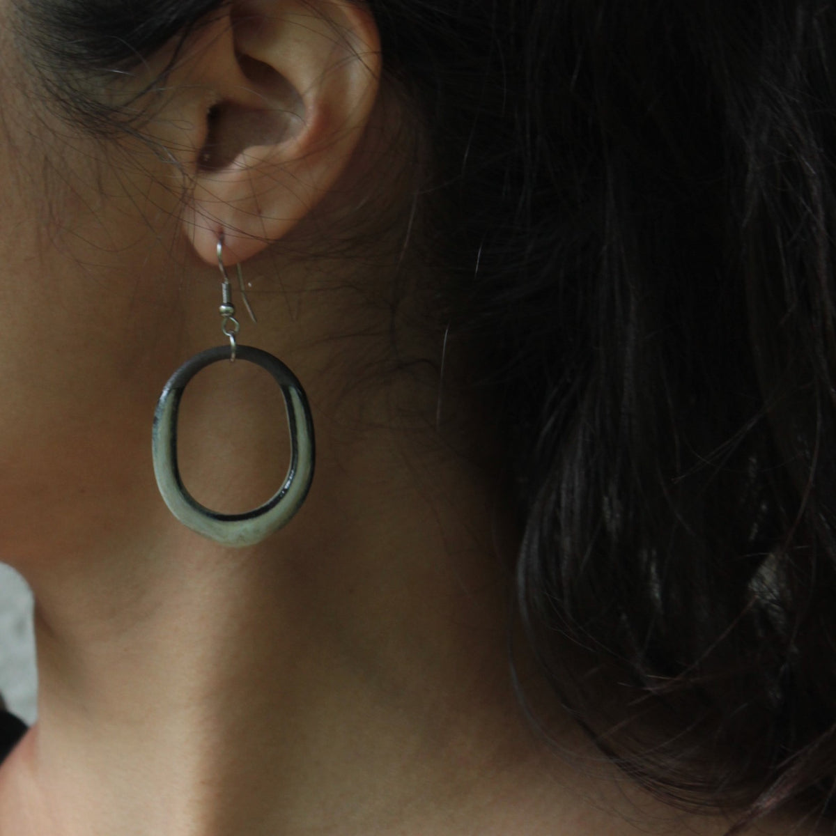Maira oval hoop dangling earrings