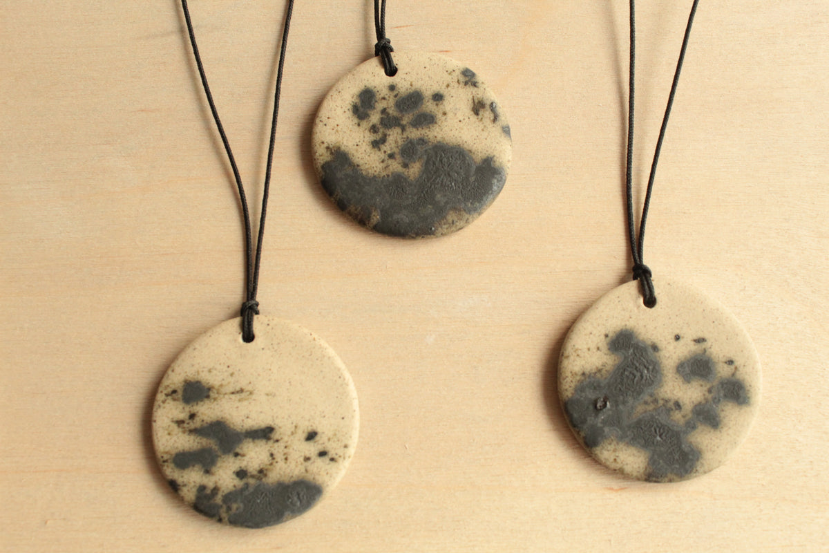 Beige with dark green design circle necklace
