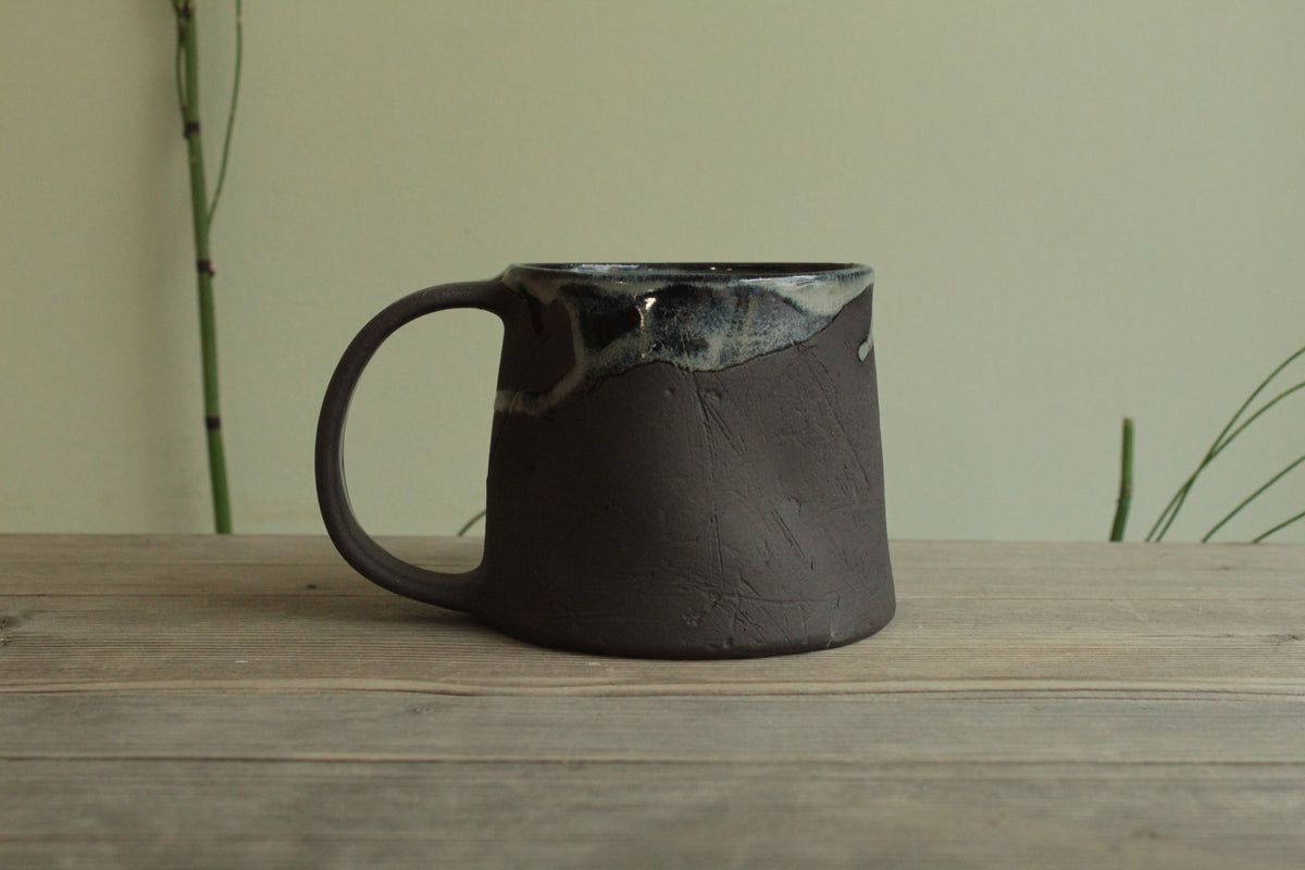 Dark sage mug with texture and drippings