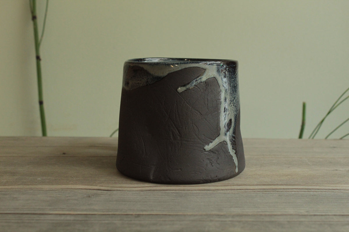 Dark sage mug with texture and drippings