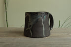 Dark sage mug with texture and drippings