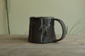 Dark sage mug with texture and drippings