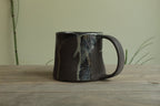 Dark sage mug with texture and drippings