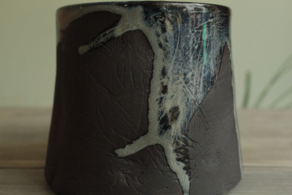Dark sage mug with texture and drippings