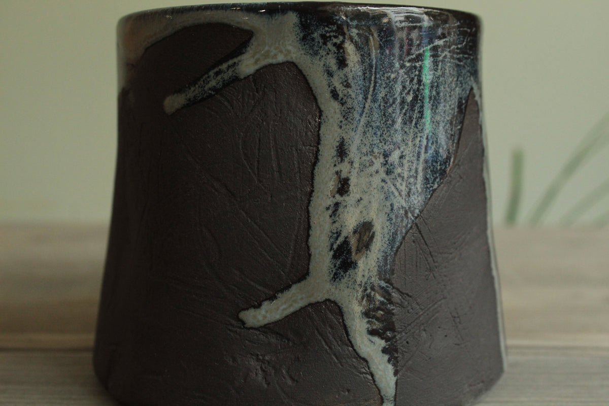 Dark sage mug with texture and drippings