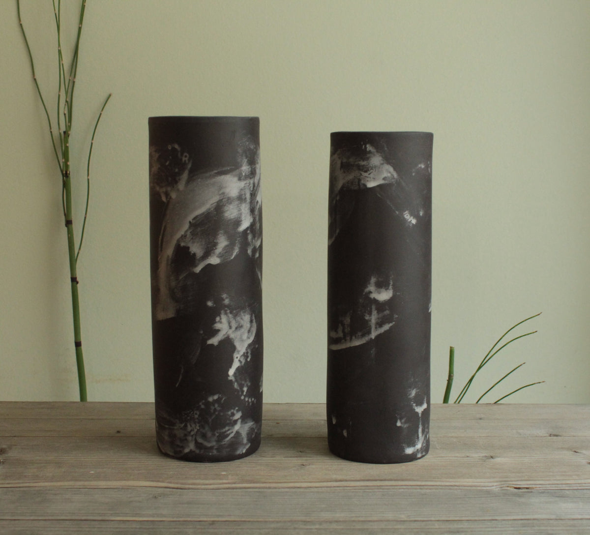 Black cylinder vase