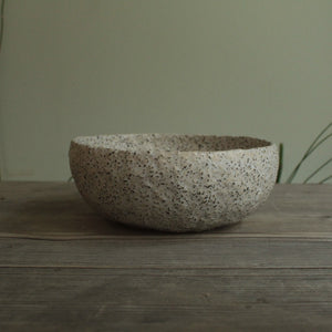 White bowls with rocks