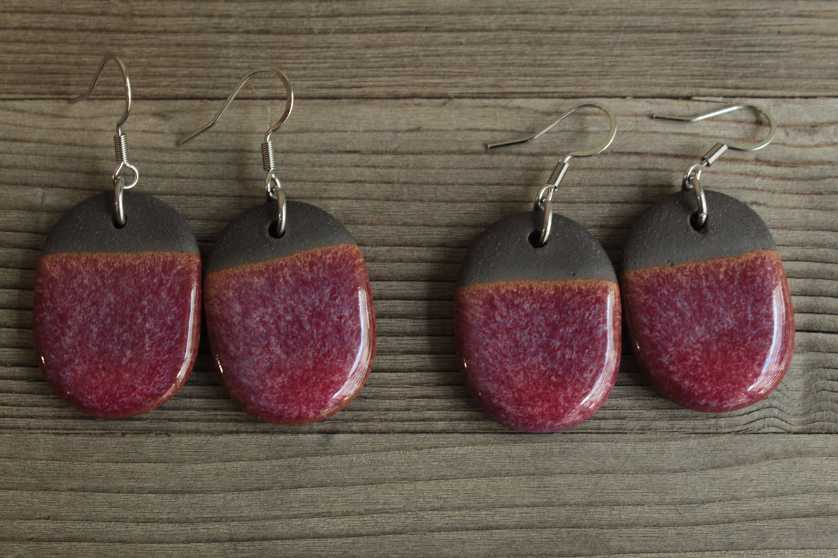 Black and red oval dangling earrings