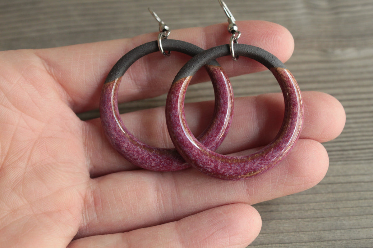 Black and red hoop dangling earrings