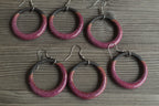 Black and red hoop dangling earrings