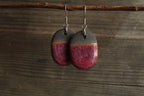 Black and red oval dangling earrings