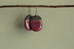 Black and red oval dangling earrings