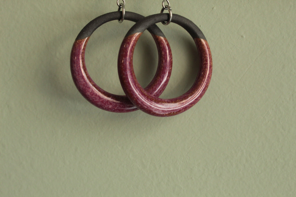 Black and red hoop dangling earrings