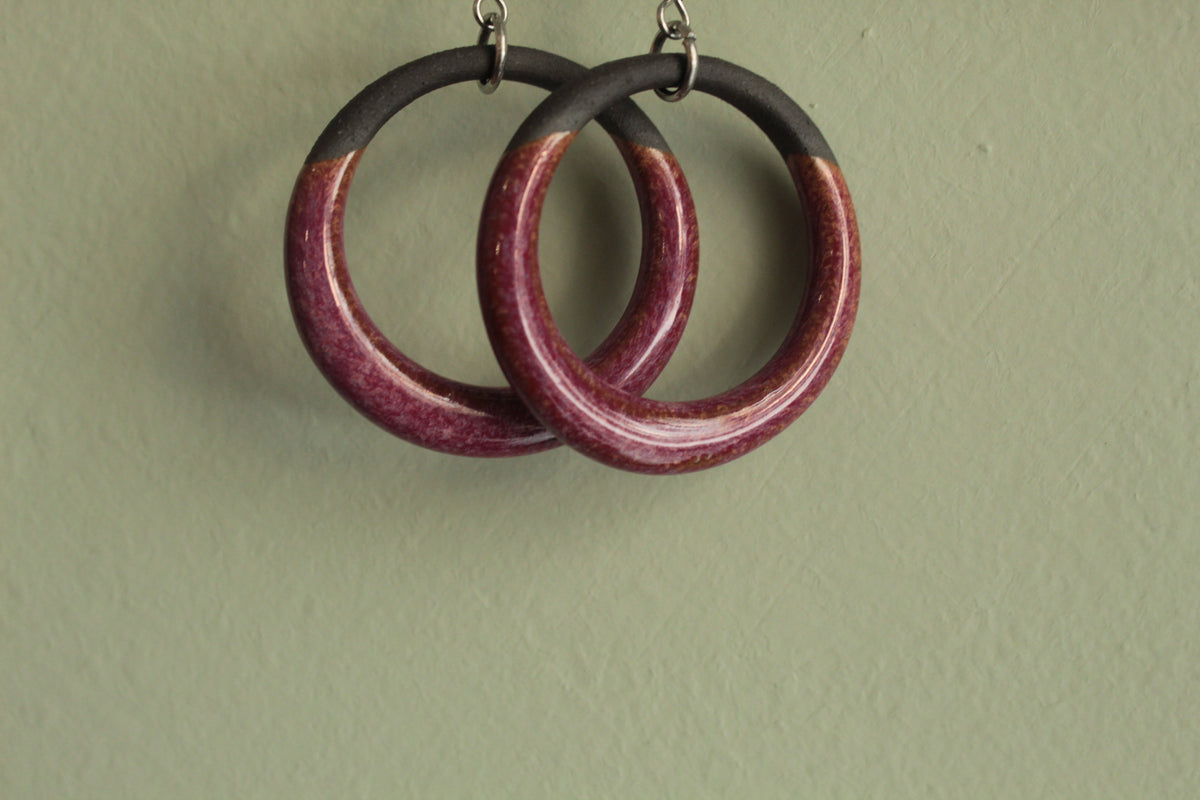 Black and red hoop dangling earrings