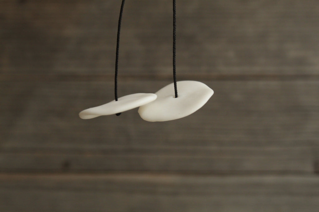 White circle porcelain dangling earrings