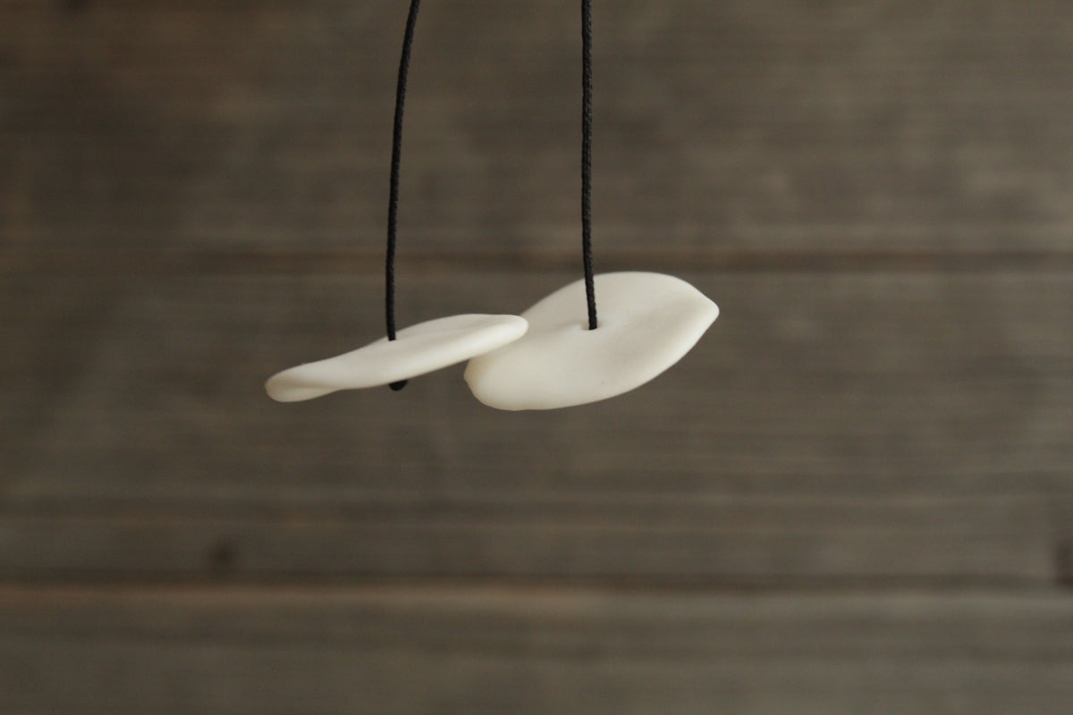 White circle porcelain dangling earrings