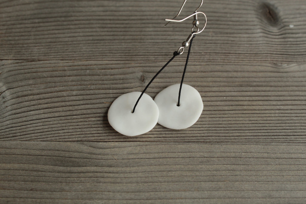 White circle porcelain dangling earrings