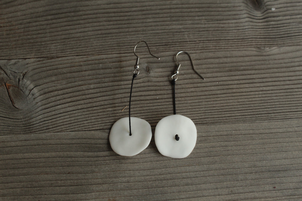 White circle porcelain dangling earrings