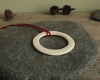 White hoop with red leather cord porcelain necklace