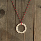 White hoop with red leather cord porcelain necklace
