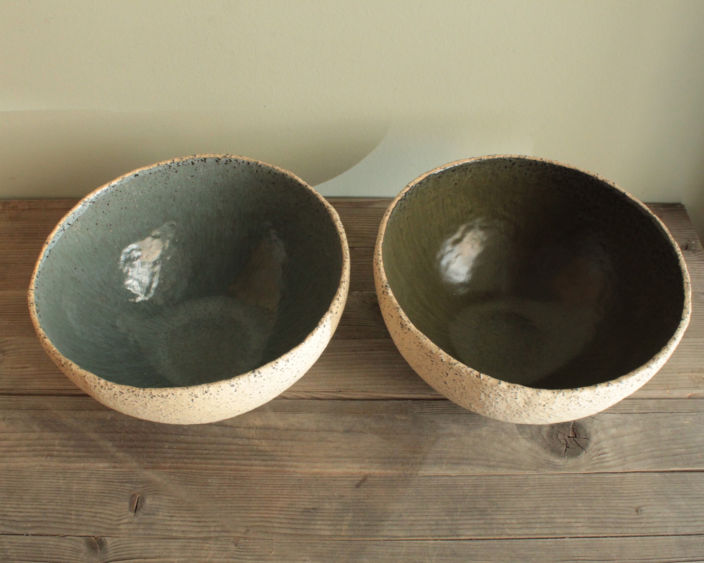 Beige bowl with ciel or green glaze