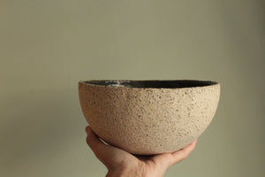 Beige bowl with ciel or green glaze