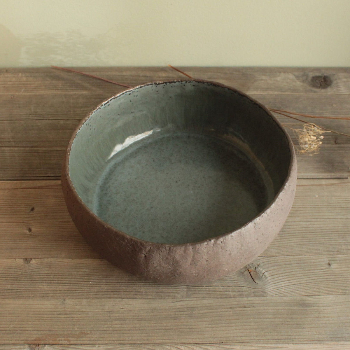 Brown and dark sage serving bowl