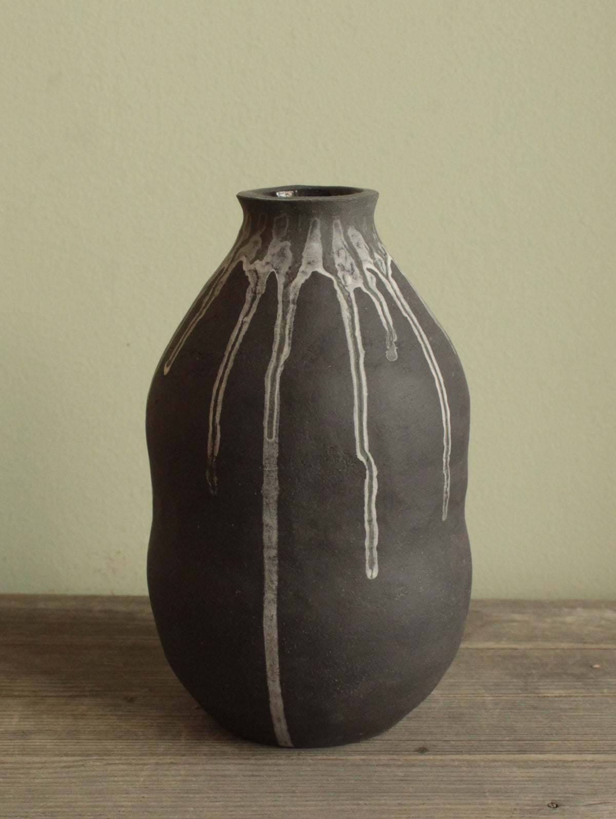 Double bellied small vase with drippings