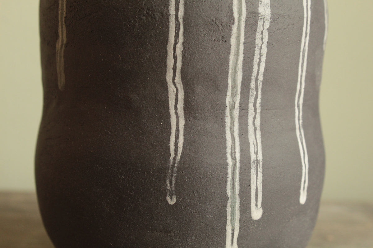 Double bellied small vase with drippings