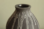 Double bellied small vase with drippings