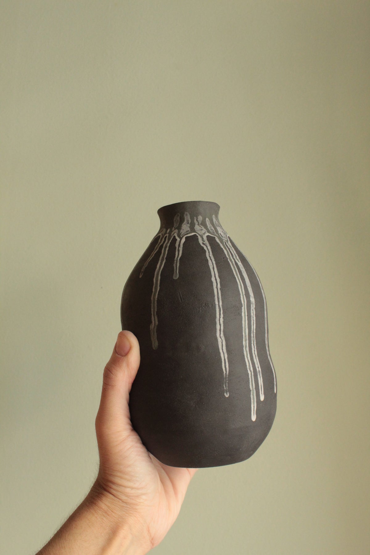 Double bellied small vase with drippings