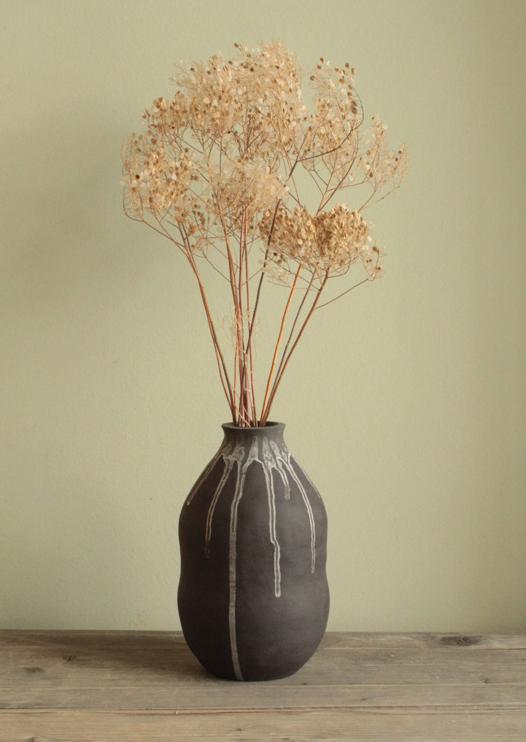 Double bellied small vase with drippings