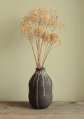 Double bellied small vase with drippings