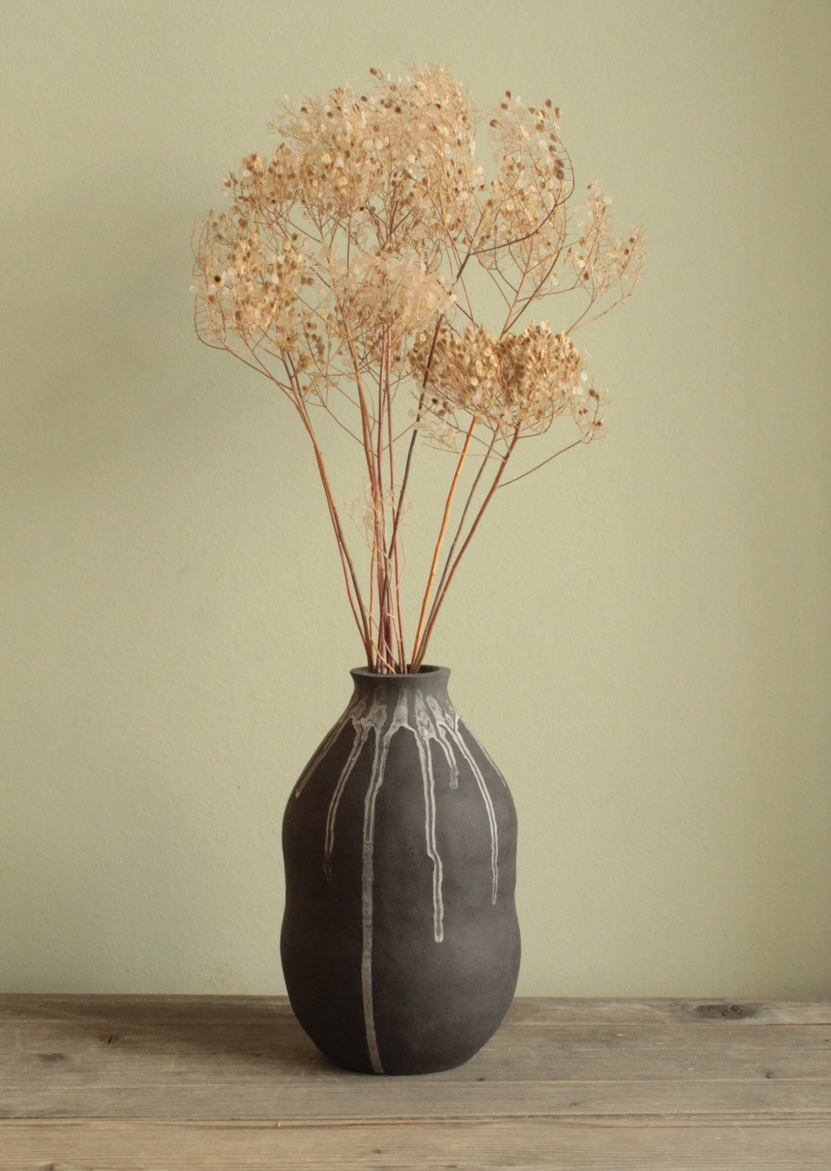 Double bellied small vase with drippings