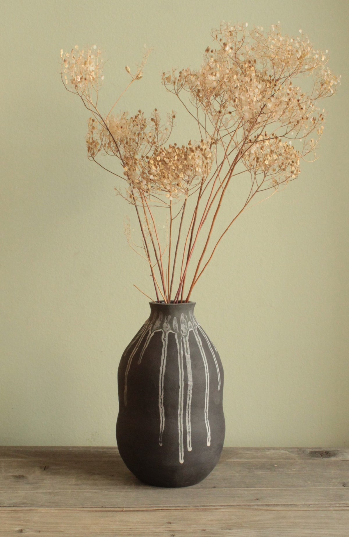 Double bellied small vase with drippings