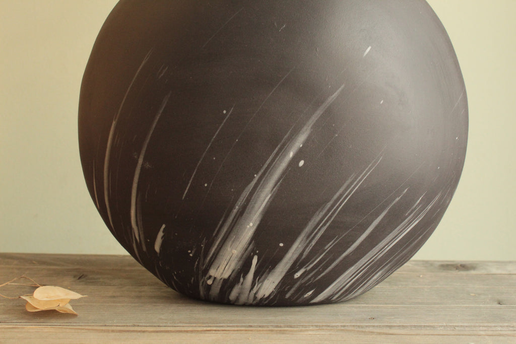 Comet rain vase