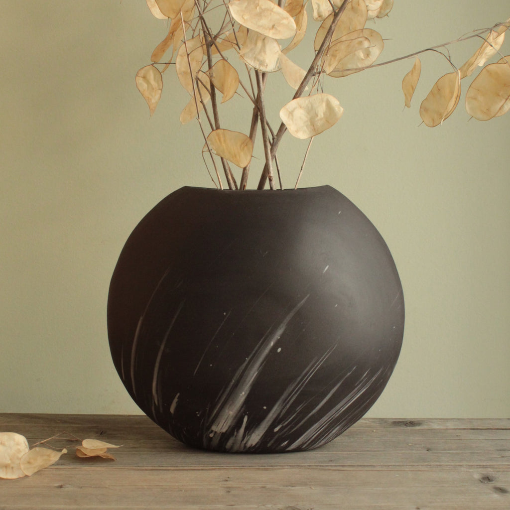 Comet rain vase