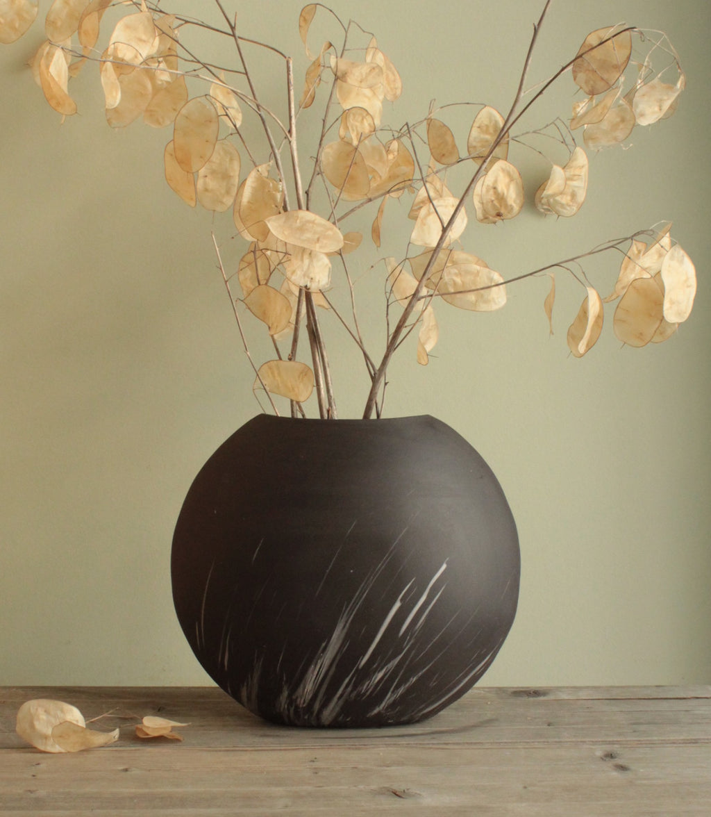 Comet rain vase