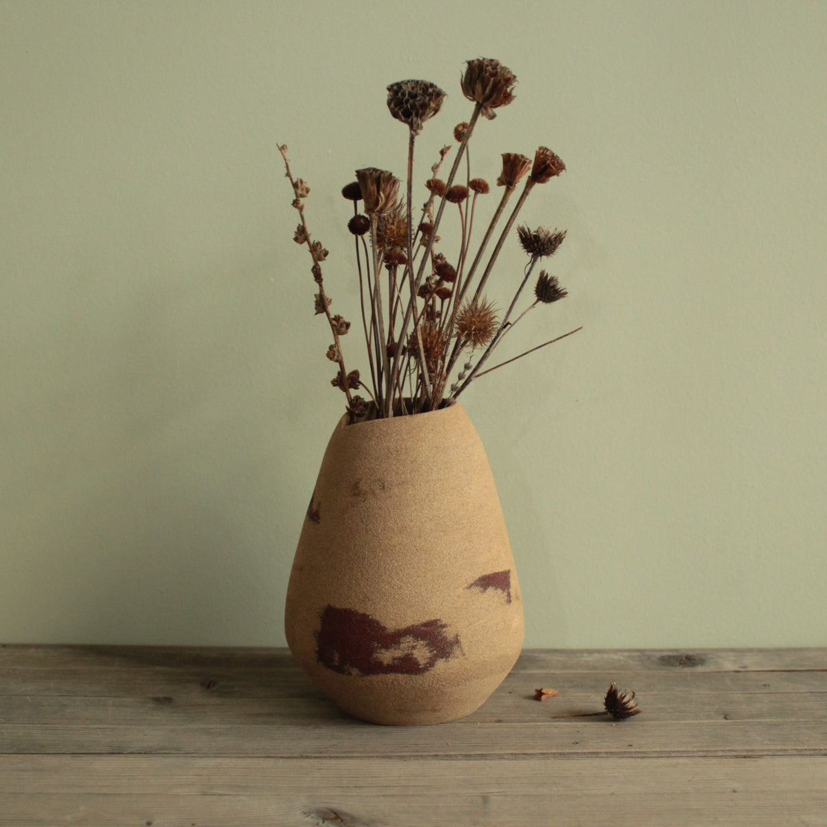 Red dino vase