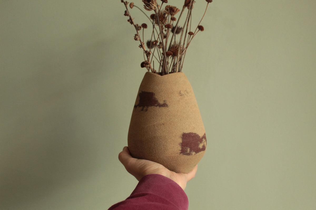 Red dino vase