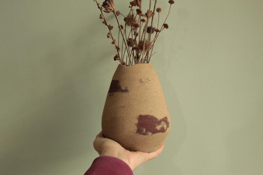 Red dino vase