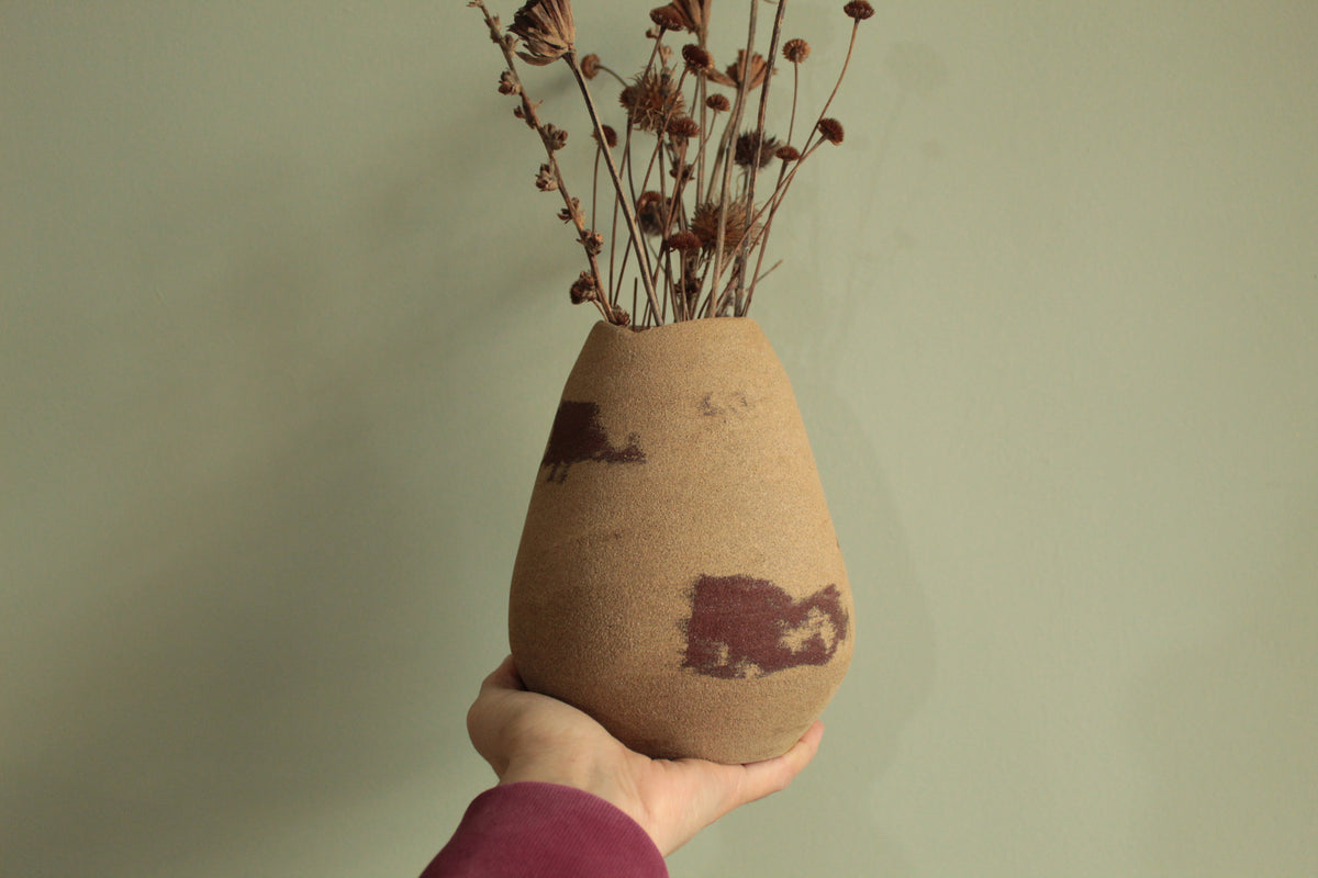 Red dino vase
