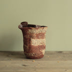Crumbled red lava vase