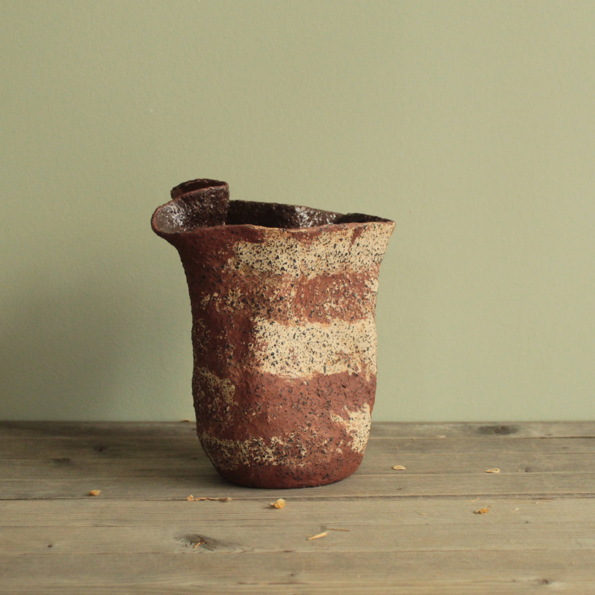Crumbled red lava vase