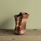 Crumbled red lava vase