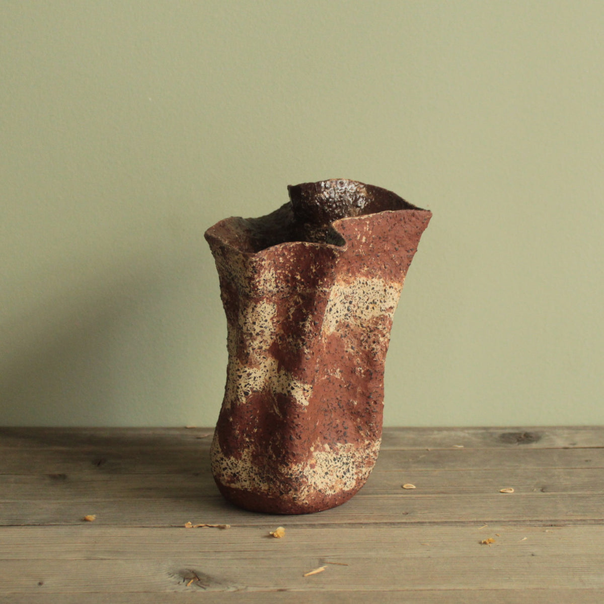 Crumbled red lava vase