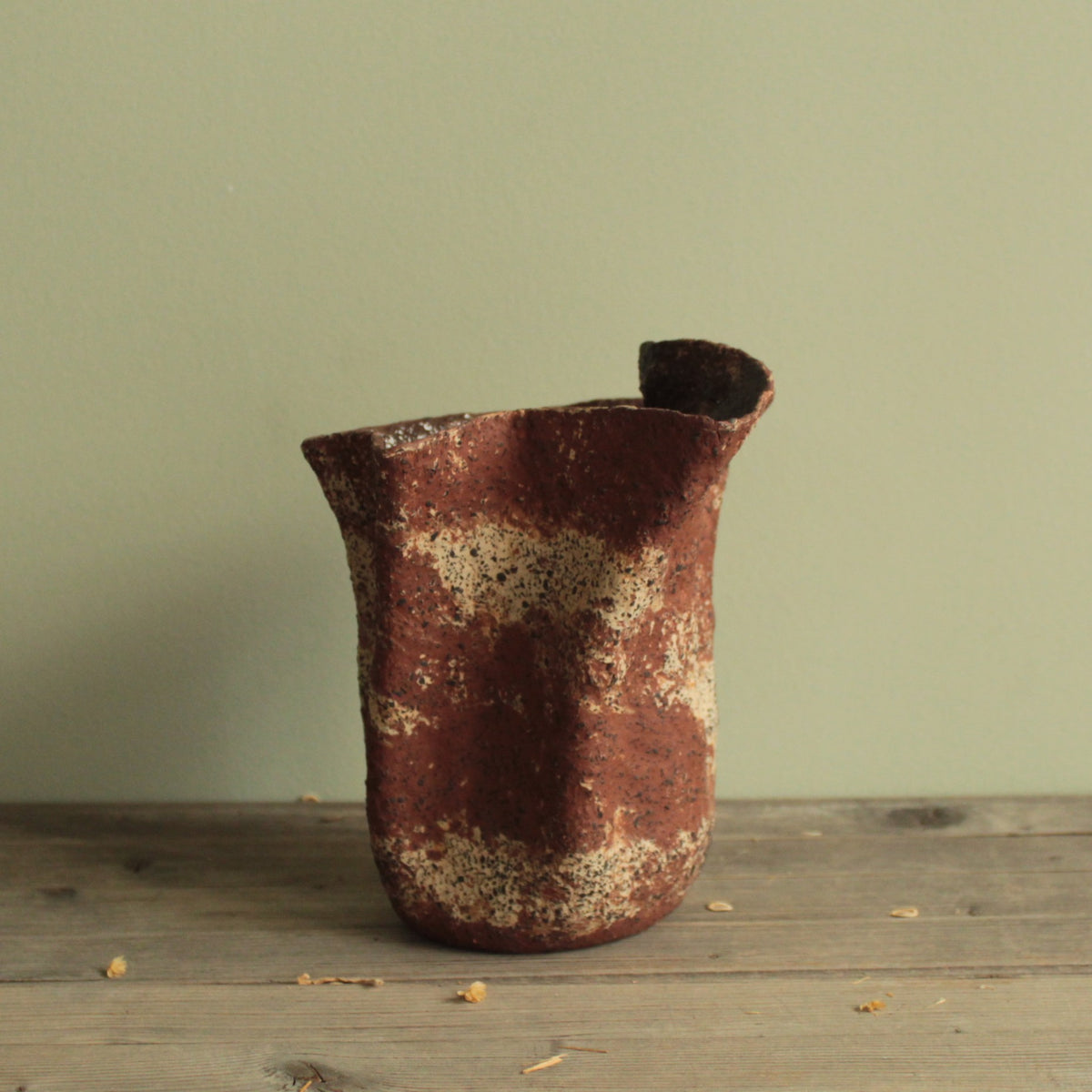 Crumbled red lava vase