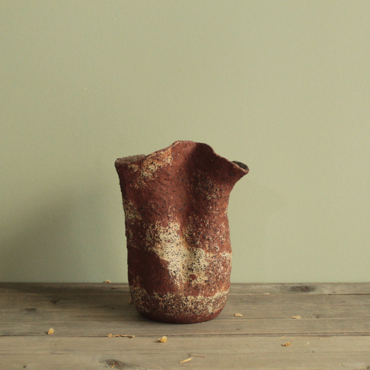 Crumbled red lava vase